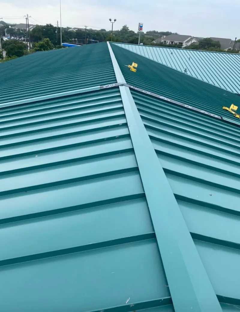 Green commercial metal roof ridge and valley for Metal Roof Repair in Santaquin